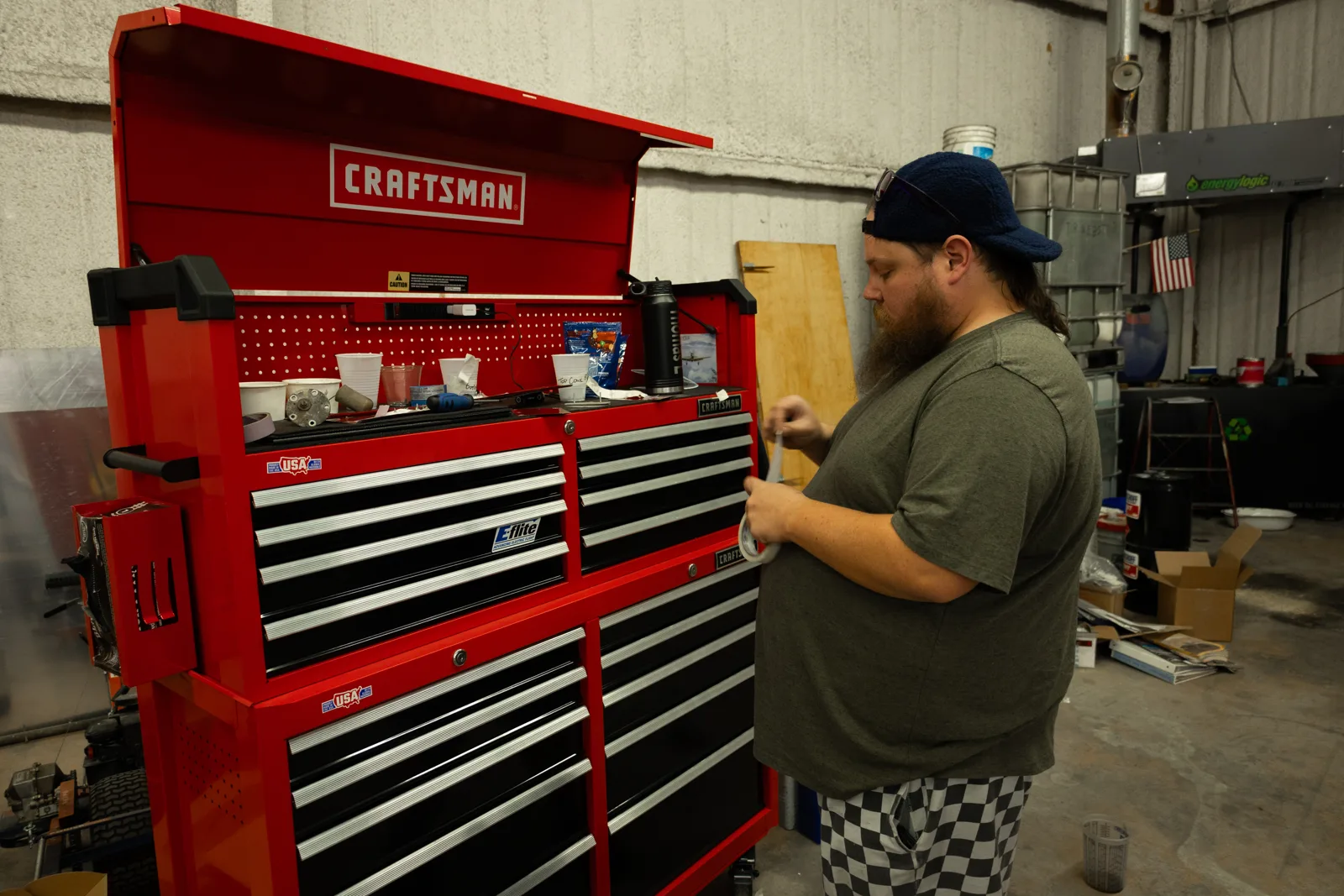 Technician working at the toolbox in the maintenance shop