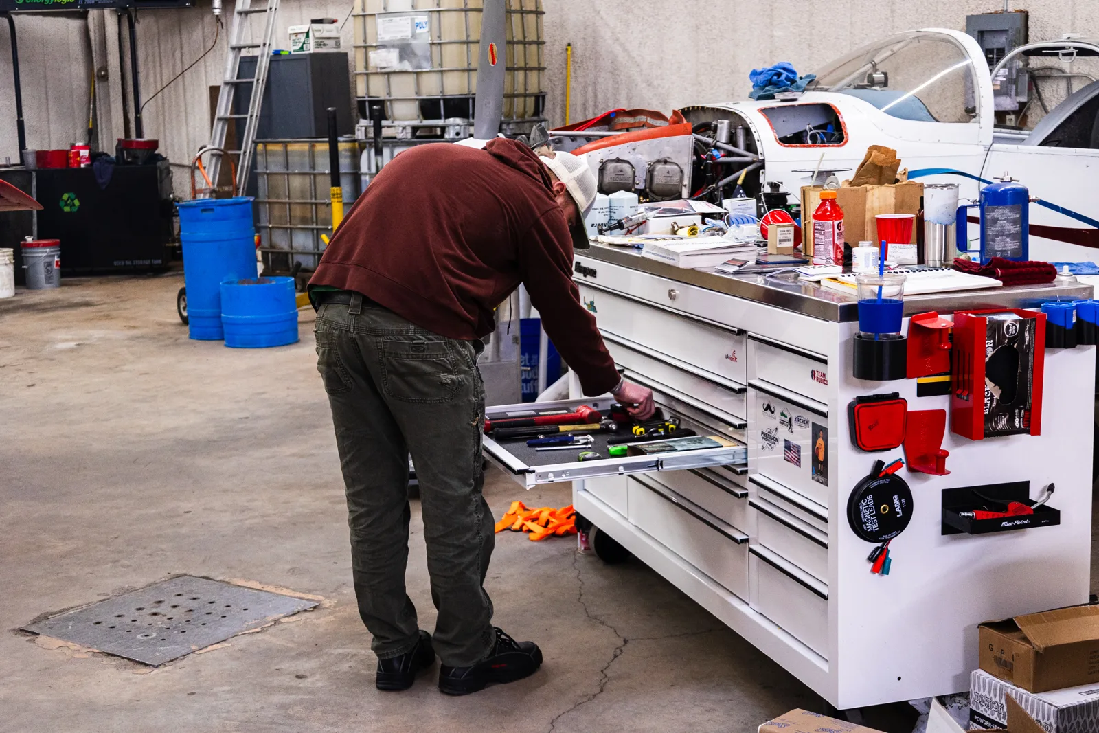 Mechanic at the workbench in the maintenance shop