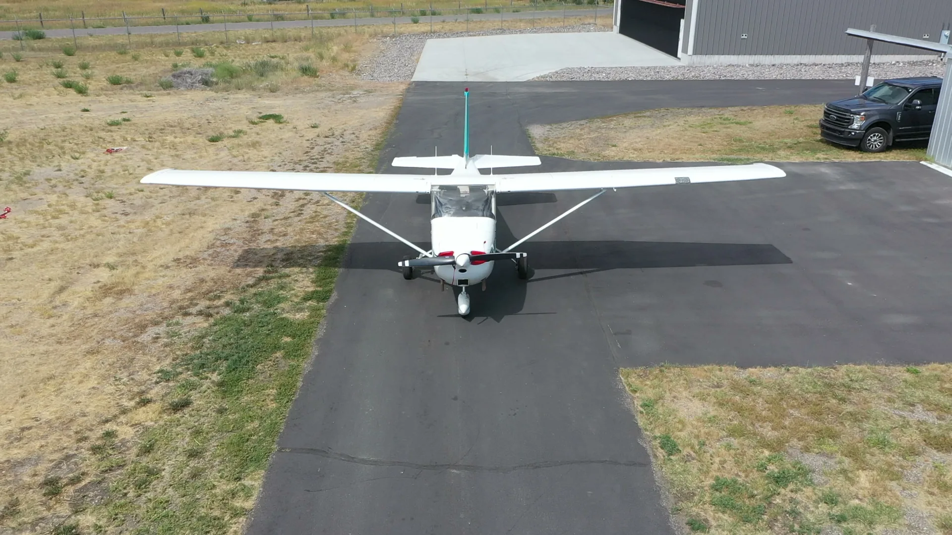 Aerial head-on of a Cessna Skyhawk with full wingspan