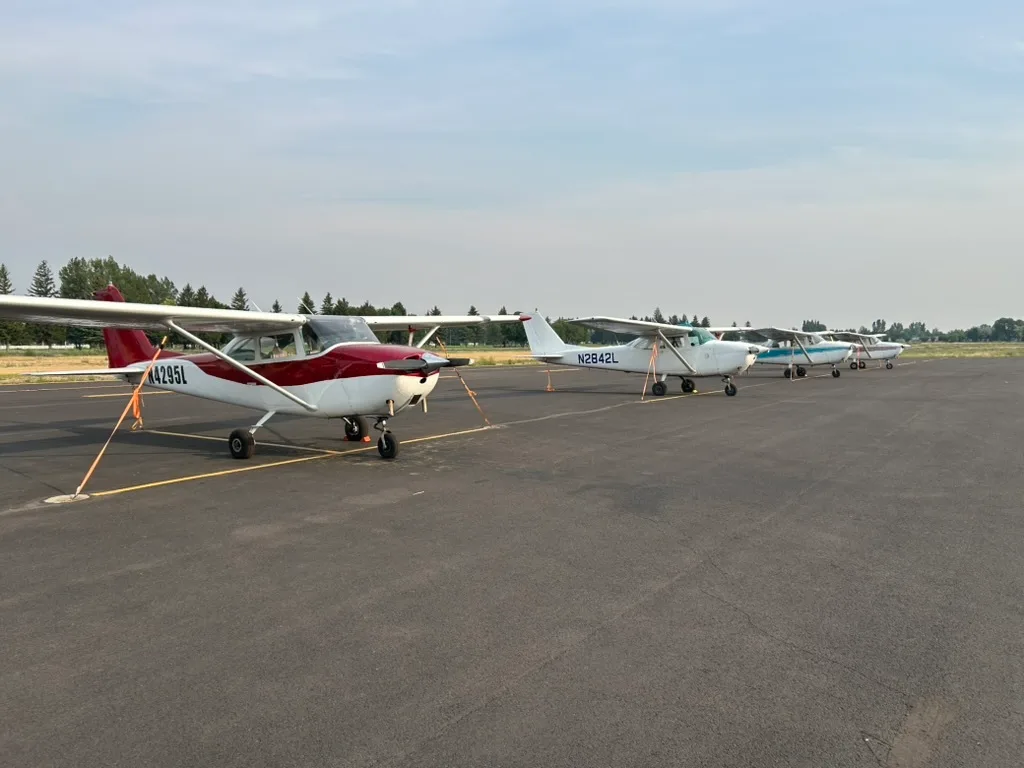 Part of the Bravo 6 Flight Academy training fleet tied down on the ramp at Rexburg